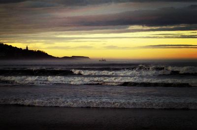 Scenic view of sea at sunset