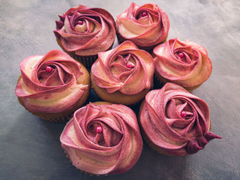 High angle view of pink roses on table