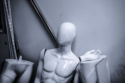 Close-up of statue against wall