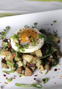 High angle view of potato with poached egg served in plate