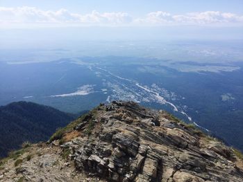 Aerial view of landscape and mountains against sky