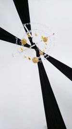 Low angle view of hanging against clear sky