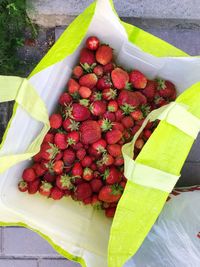 High angle view of strawberries on table