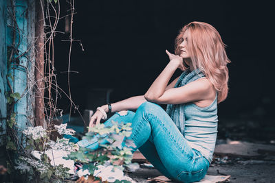 Side view of young woman looking away