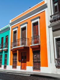 San juan puerto rico el morro street on a corner with colored apartments, walls and doors