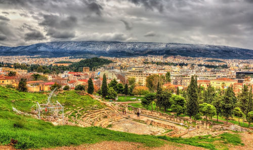 High angle view of townscape against cloudy sky