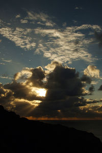 Low angle view of dramatic sky during sunset