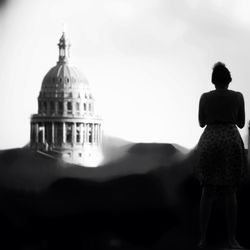 Woman standing against sky