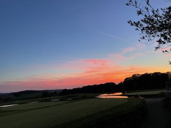 Scenic view of silhouette landscape against sky during sunset