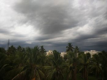 Scenic view of farm against sky