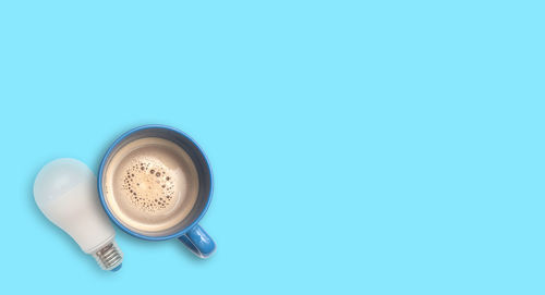 Directly above shot of coffee cup on table