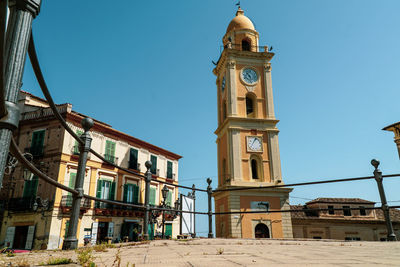 Low angle view of buildings against clear sky