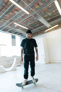 Full length portrait of smiling man