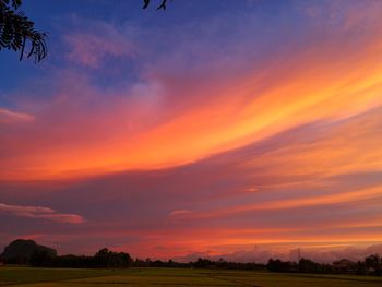Scenic view of silhouette landscape against sky during sunset