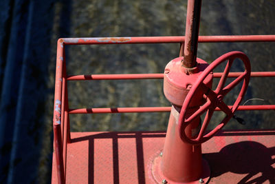 Close-up of red railing