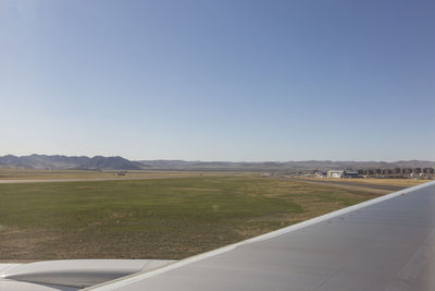 Scenic view of landscape against clear blue sky