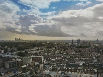 High angle view of buildings in city against sky