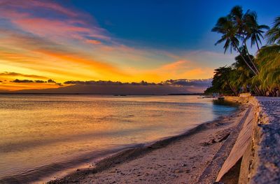 Scenic view of beach during sunset