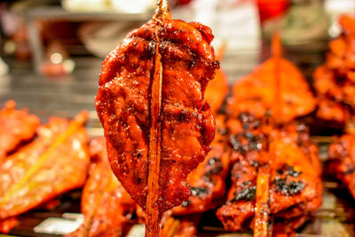 Close-up of meat on barbecue grill