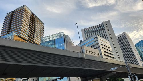Low angle view of modern buildings against sky