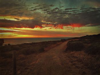 Scenic view of landscape at sunset