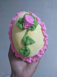 Cropped image of hand holding ice cream