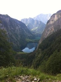 Scenic view of lake and mountains against sky