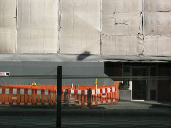 Barricades on footpath by building