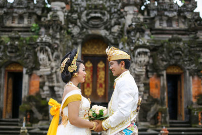 Wedding couple in balinese traditional clothes