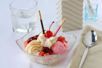 High angle view of fresh dessert served in plate on table at restaurant