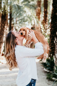 Woman with dog at park