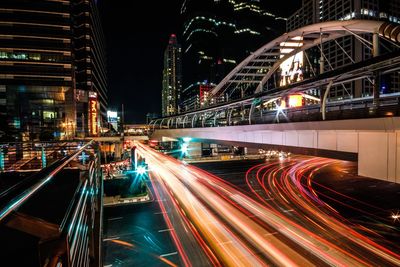 High angle view of light trails on road at night