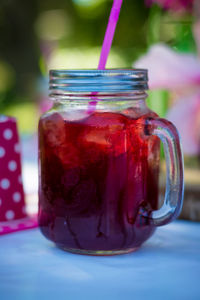 Close-up of drink in jar on table