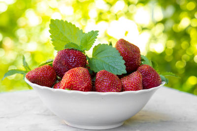 Close-up of strawberries in bowl on table