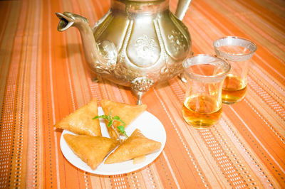 High angle view of drinks on table