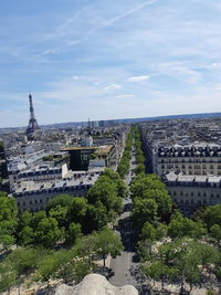 High angle view of trees and buildings against sky