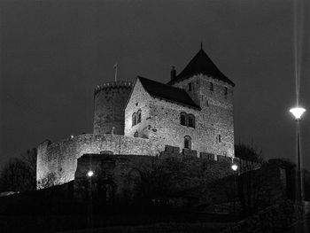 Low angle view of historical building against sky at night