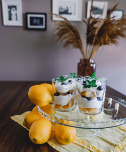 Close-up of fruits in plate on table