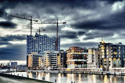 Low angle view of buildings in city against sky