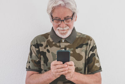 Portrait of man using mobile phone