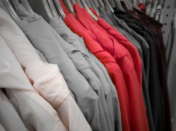 Full frame shot of clothes hanging on rack in store