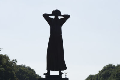 Low angle view of statue against clear sky