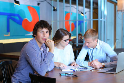 Business colleagues working at office