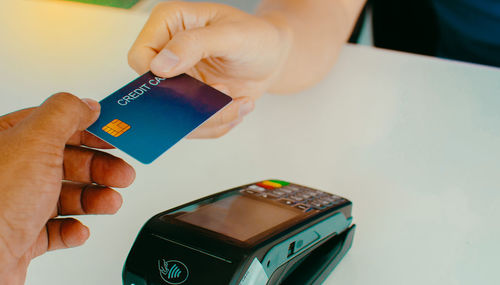 Close-up of person holding camera