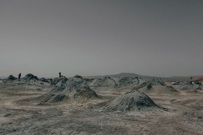 Scenic view of desert against clear sky