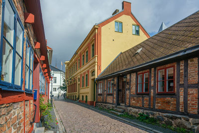 Street with older half timbered houses with a cobblestoned street