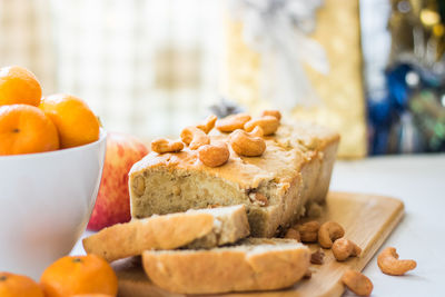 Close-up of orange slices in plate on table