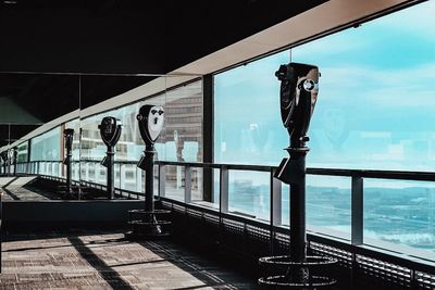 Binoculars by window in one world trade center