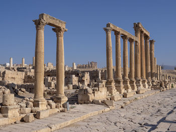 Ruins of temple against clear sky