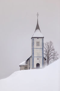 Church against sky during winter